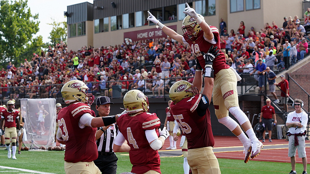 Coe celebrates during rout of Cornell