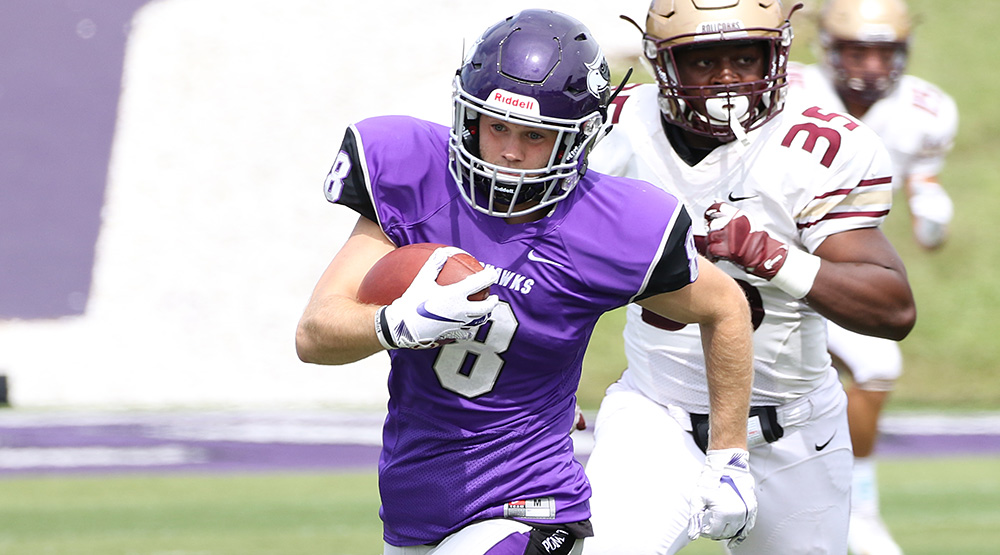 Josh Ringelberg, returning a punt against Concordia-Moorhead. (d3photography.com file photo by Daryl Tessmann)