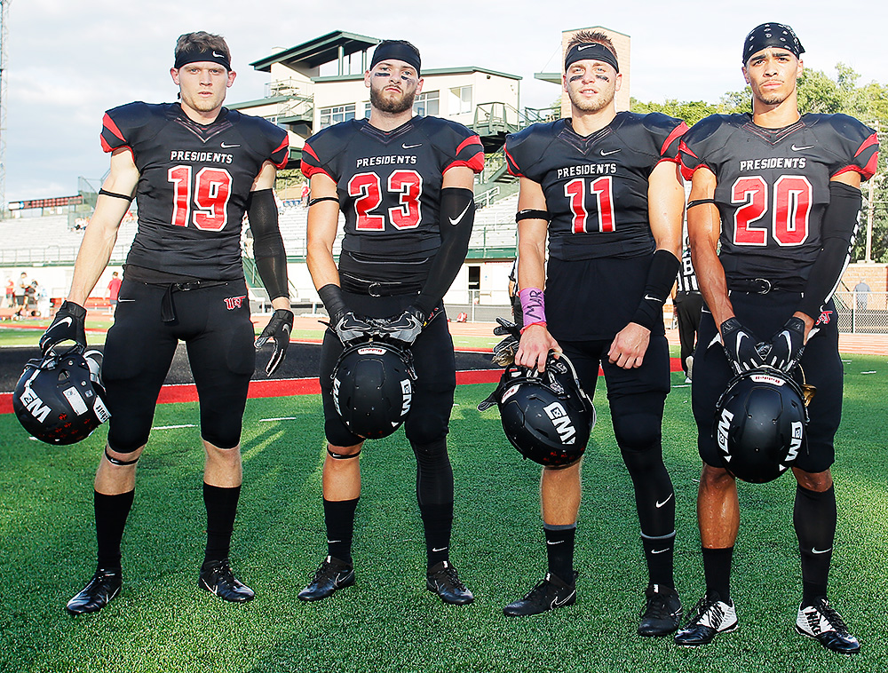 Washington & Jefferson starting defensive players Zac Quattrone, Zack Queen, Zach Royba and Zac Taylor in a posed shot at W&J's Cameron Stadium. (Photo by Martin Santek Photography for Washington & Jefferson athletics)